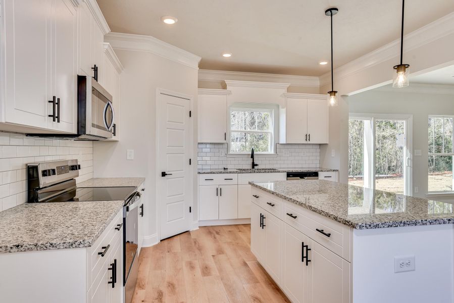 Furnished interior view inside a new home in , Edgefield (Image 7).
