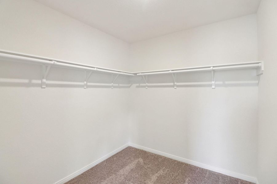 Look at this immaculate closet! With high shelving, multiple rows to hang clothing, you are sure to have enough room for all your belongings!