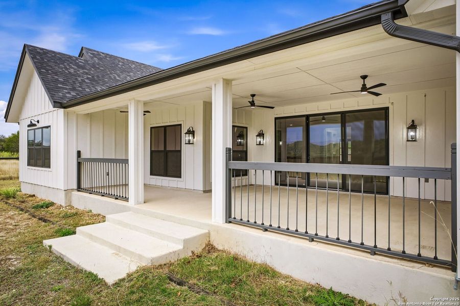 Exterior details and patio area of a home in , Bandera (Image 34).