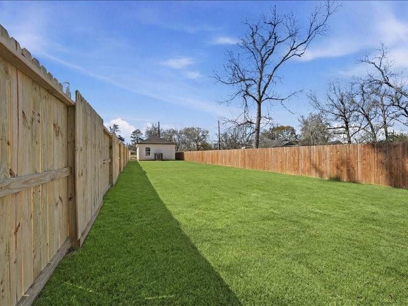 Exterior details and patio area of a home in , Houston (Image 3).