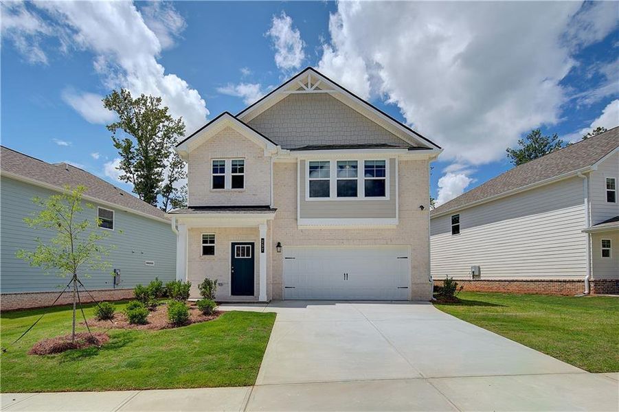 Front exterior of a new home in Westminster, Covington, GA, highlighting curb appeal (Image 16). Front exterior of a new home in Westminster, Covington, GA, highlighting curb appeal (Image 16).