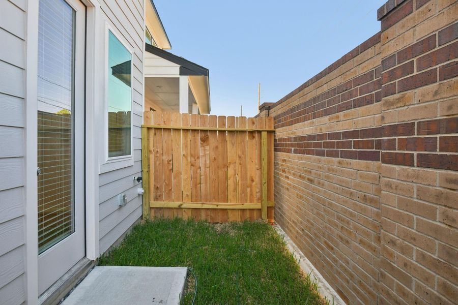 Exterior details and patio area of a home in Spring Brook Village - City Series, Houston (Image 3).