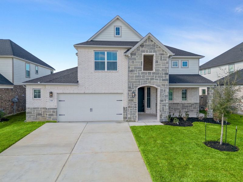 Front exterior of a new home in Beacon Hill, Waller, TX, highlighting curb appeal (Image 2).