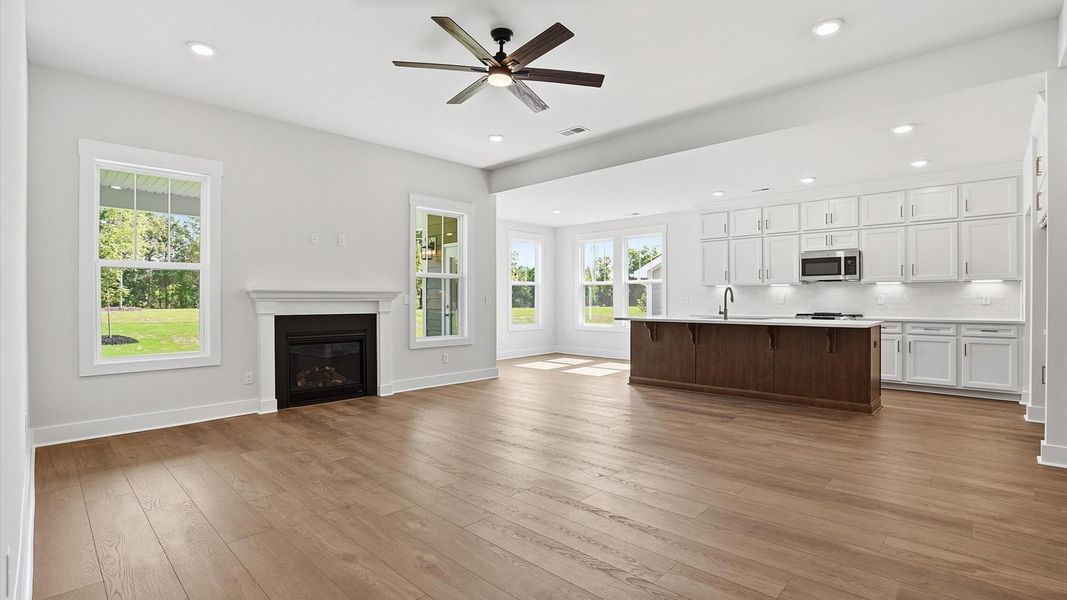 Refined and memorable, this family room features high ceilings and top-notch comfort throughout at Benjamin's Grove Refined and memorable, this family room features high ceilings and top-notch comfort throughout at Benjamin's Grove