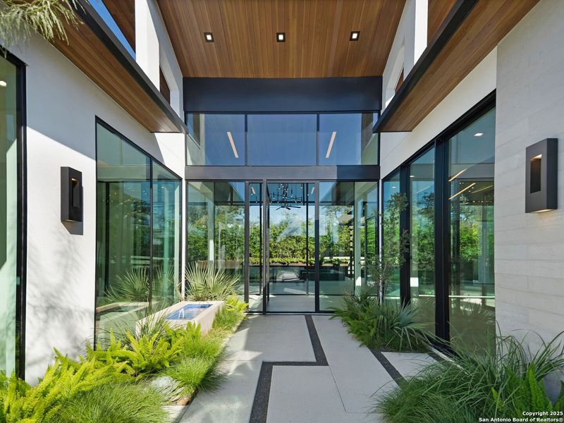Exterior details and patio area of a home in , San Antonio (Image 43).
