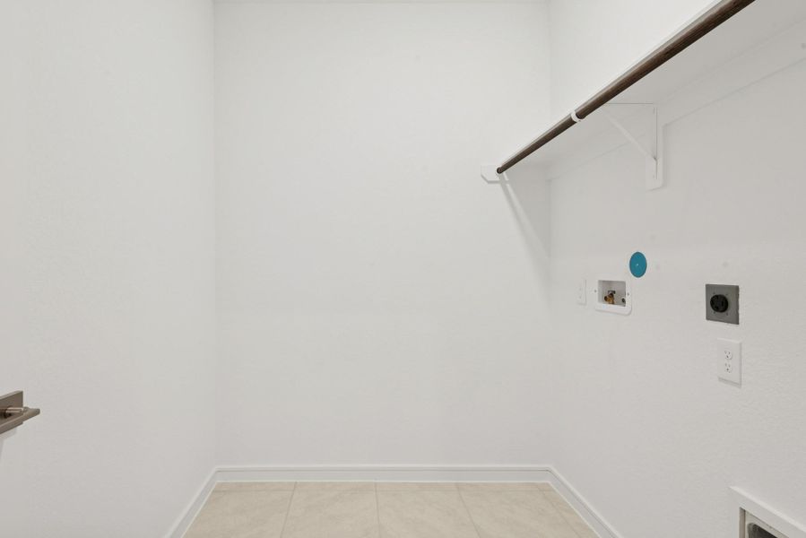 Laundry room (*Photo not of actual home and used for illustration purposes only.)