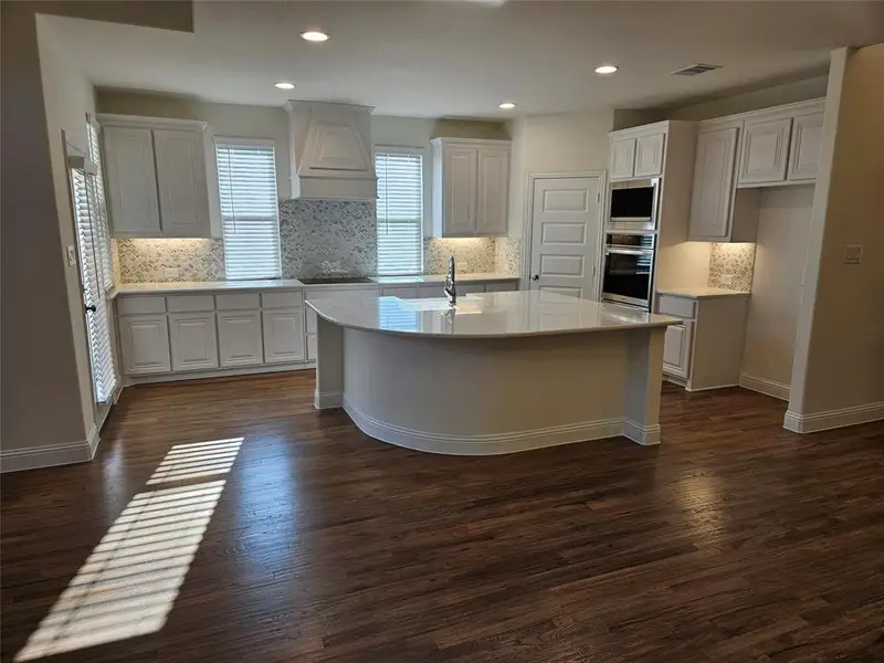 Furnished interior in a model home at Pecan Grove in Whitesboro (Image 3).