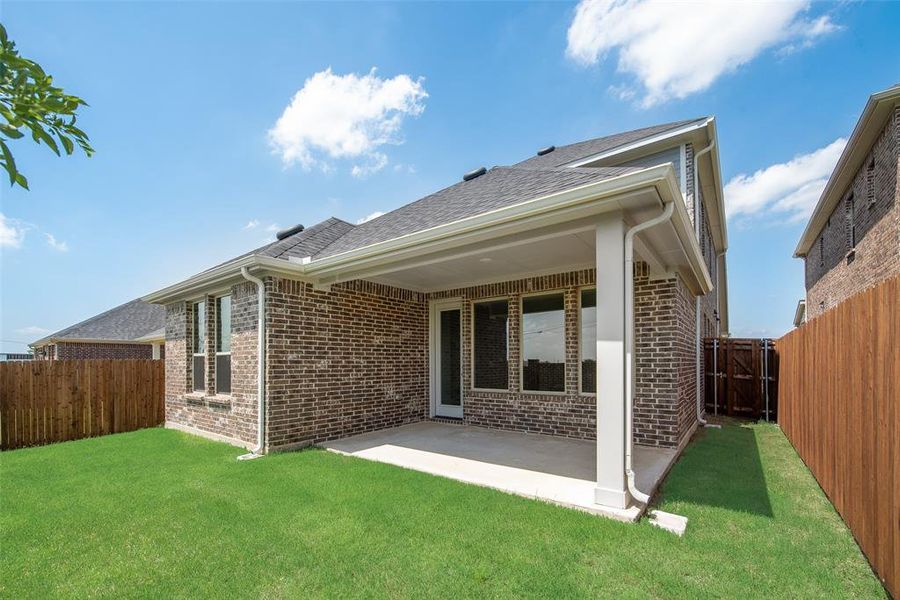 Front exterior of a new home in Walden Pond, Forney, TX, highlighting curb appeal (Image 23).