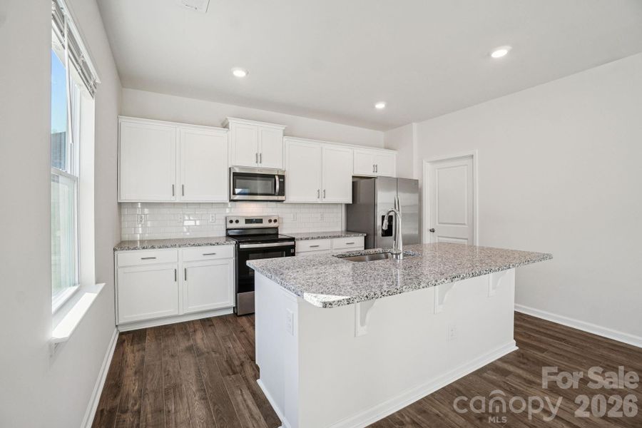 Furnished interior view inside a new home in Rydele Heights, Asheville (Image 9).