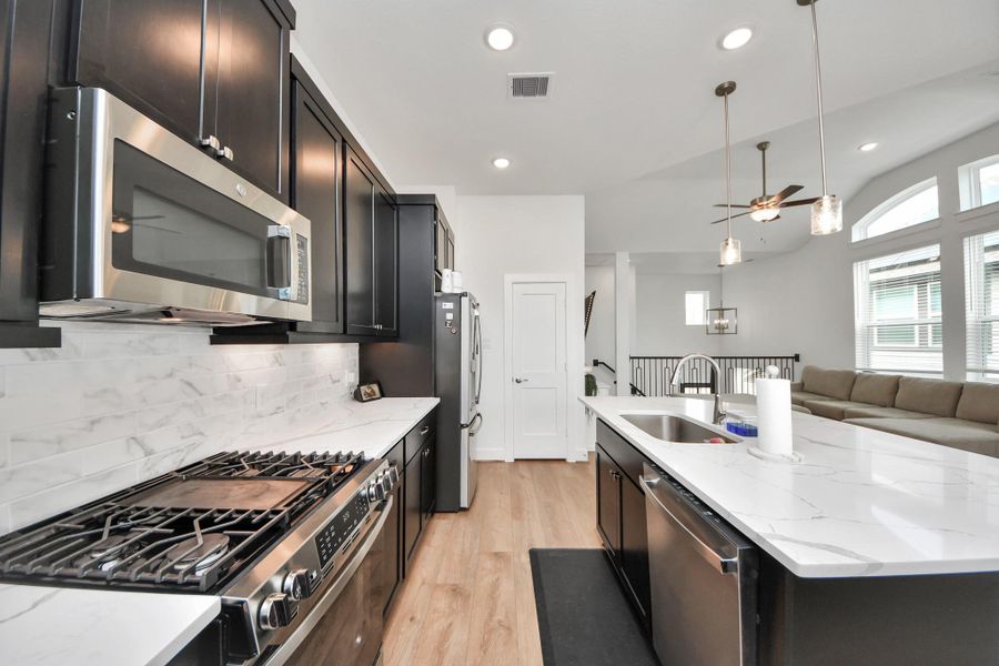 Furnished interior view inside a new home in Meridiana Courtyard Collection, Manvel (Image 18).