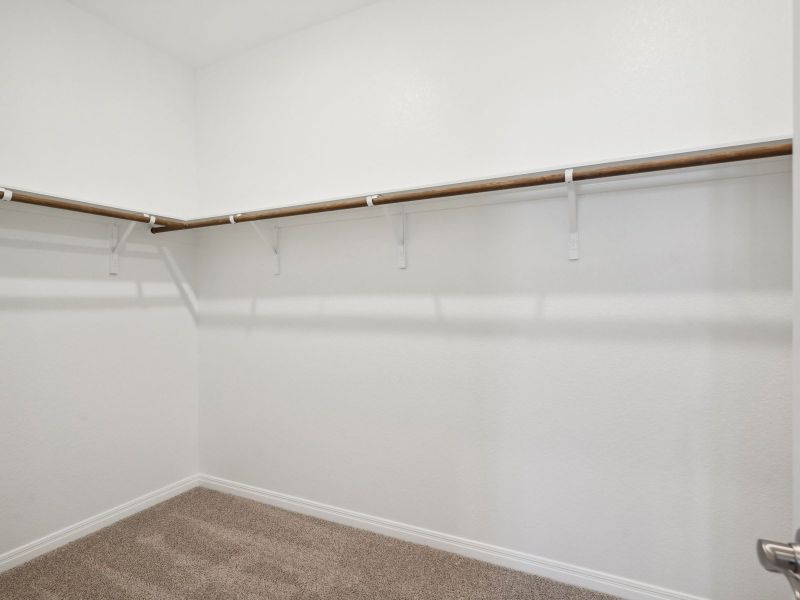 Spacious, unfurnished interior of a new home in Turner's Crossing - Reserve Collection, Buda (Image 11).