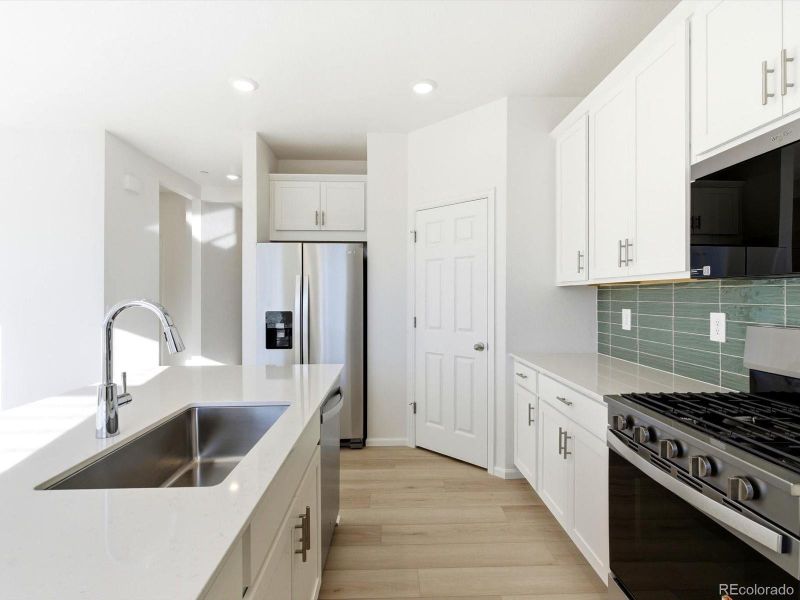 Furnished interior view inside a new home in Buffalo Highlands: The Flora Collection, Commerce City (Image 11).