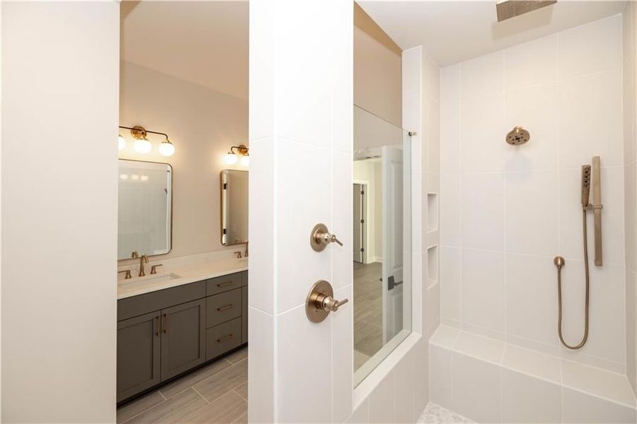 Large walk in shower option allows you to still add extra rainheads and hand helds*Image is of previously built home* Large walk in shower option allows you to still add extra rainheads and hand helds*Image is of previously built home*