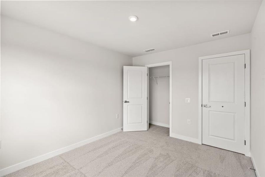 Spacious, unfurnished interior of a new home in Lakes at Riverbend Townhomes, Navassa (Image 19).