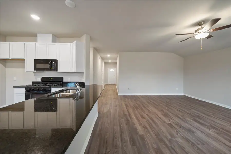 Furnished interior view inside a new home in Lexington Heights, Willis (Image 4).