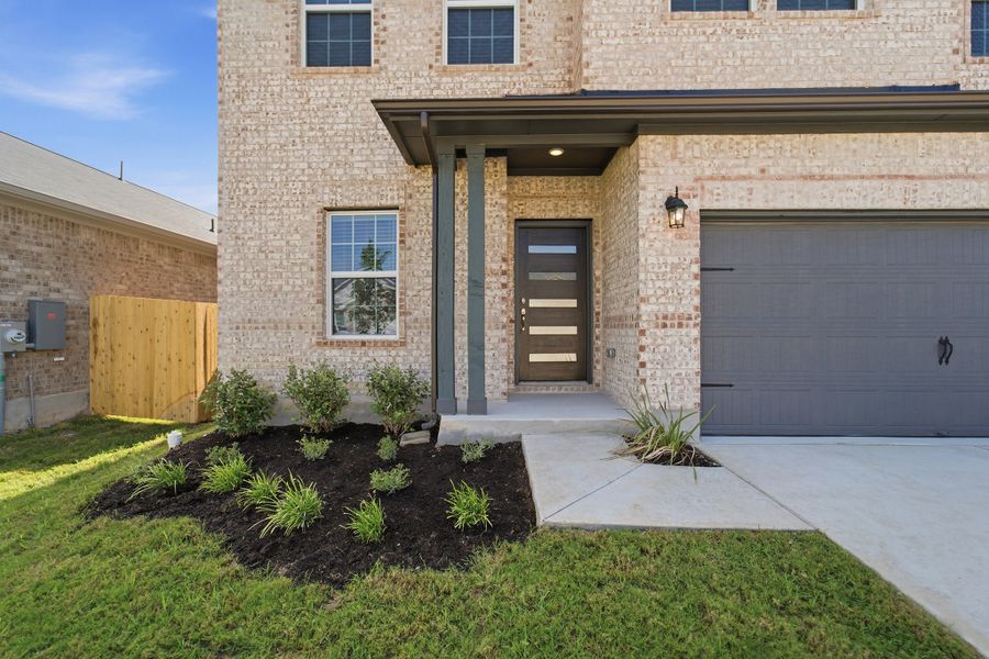 Exterior details and patio area of a home in Sunfield, Buda (Image 3). Exterior details and patio area of a home in Sunfield, Buda (Image 3).
