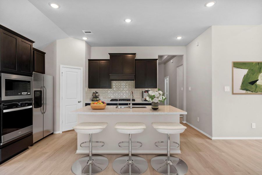 Furnished interior view inside a new home in The Highlands 45', Porter (Image 5).