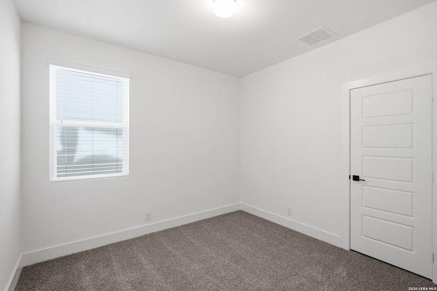 Spacious, unfurnished interior of a new home in Centero at Stone Oak, San Antonio (Image 23).
