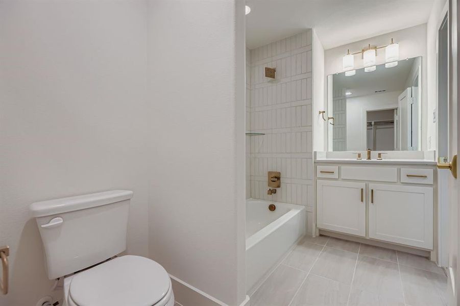 Furnished interior view inside a new home in , The Colony (Image 14).