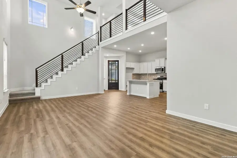 Spacious, unfurnished interior of a new home in Hunters Ranch, San Antonio (Image 19).