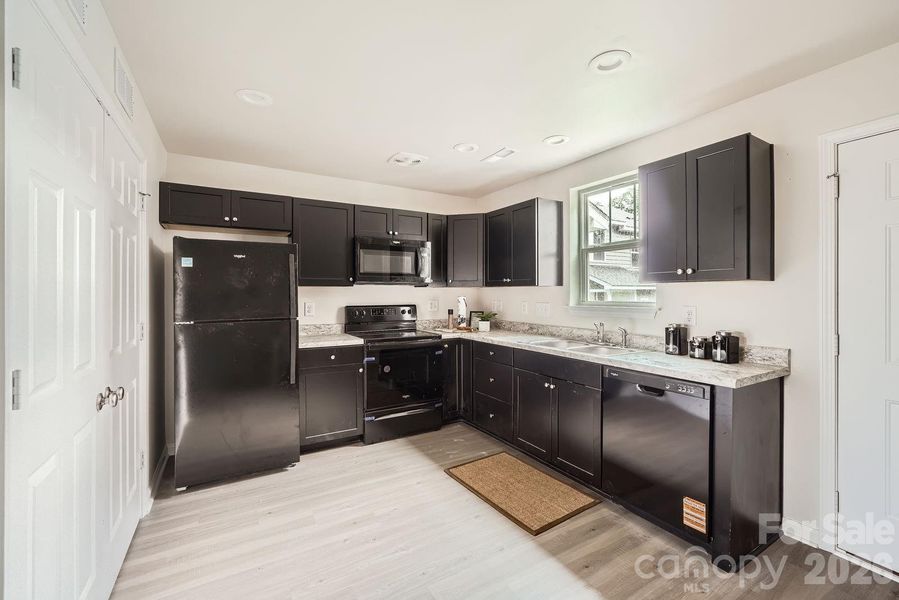 Furnished interior view inside a new home in , Charlotte (Image 12).