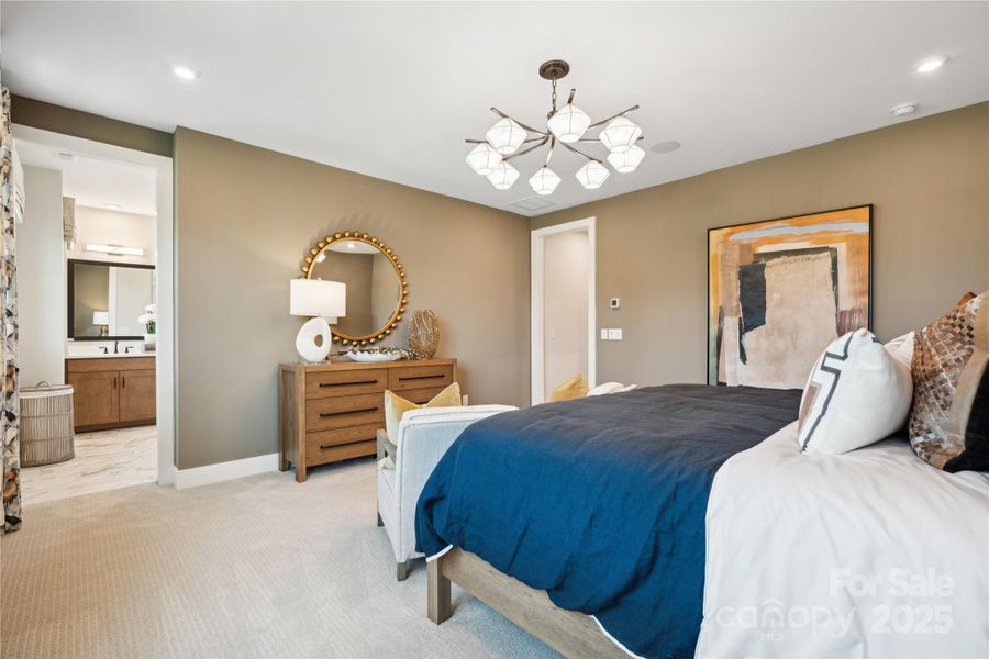 Sneak peak into the en suite primary bath that will become your new favorite spa. *Model Photos | actual finishes, structural selections, and orientation may vary.