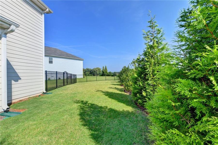 Exterior details and patio area of a home in Sweetbay Farm, Lawrenceville (Image 30).