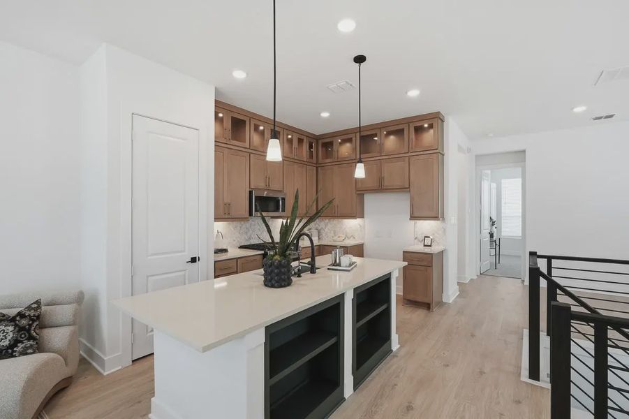 Furnished interior view inside a new home in Centero at Stone Oak, San Antonio (Image 10).