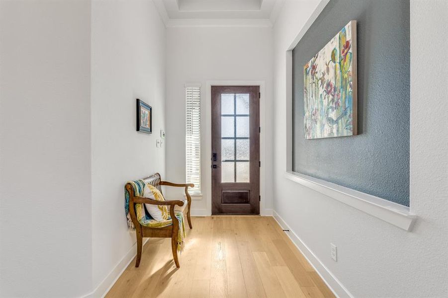 Doorway featuring light hardwood / wood-style floors