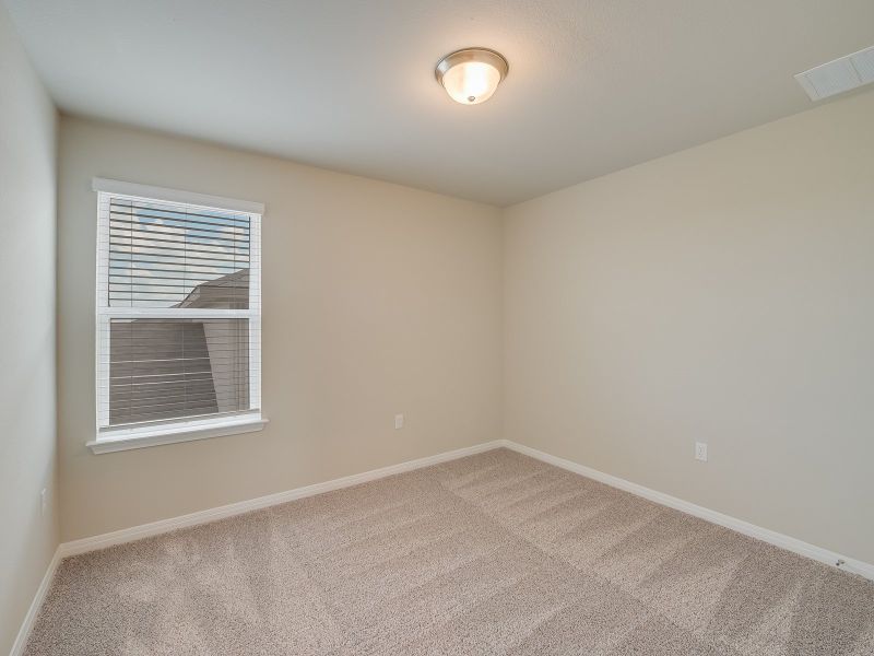 Spacious, unfurnished interior of a new home in Turner's Crossing - Reserve Collection, Buda (Image 13).
