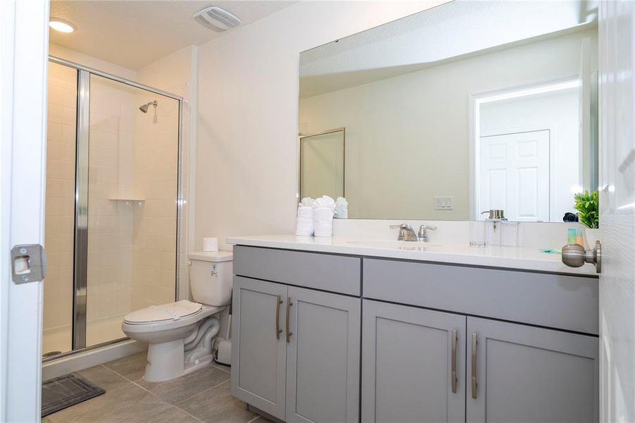 Furnished interior view inside a new home in Solara Resort, Kissimmee (Image 33).