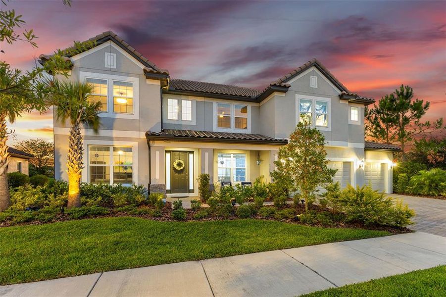 Front exterior of a new home in , Wesley Chapel, FL, highlighting curb appeal (Image 2). Front exterior of a new home in , Wesley Chapel, FL, highlighting curb appeal (Image 2).