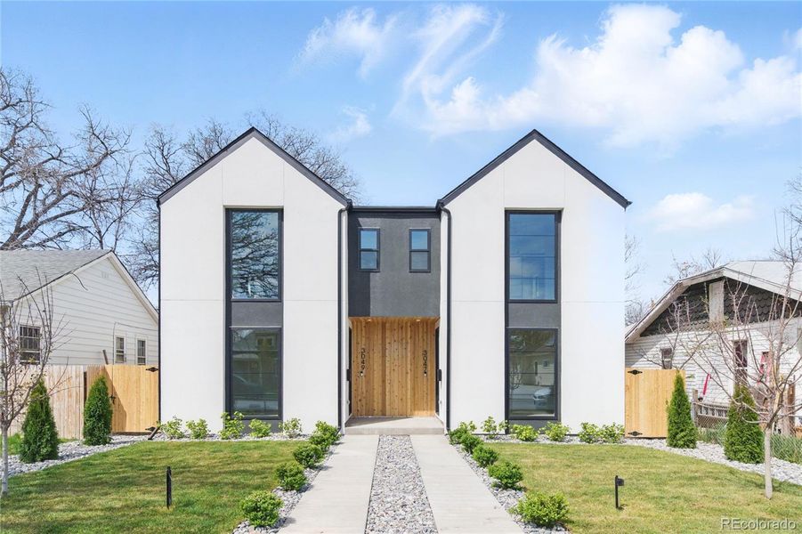 Front exterior of a new home in , Englewood, CO, highlighting curb appeal (Image 2).