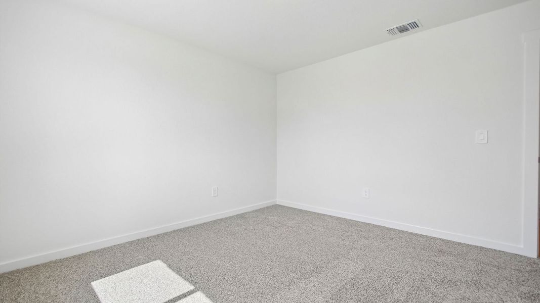 Spacious, unfurnished interior of a new home in Trails at Wildhorse, Austin (Image 31).
