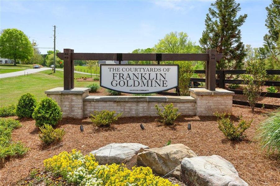 Front exterior of a new home in The Courtyards of Franklin Goldmine, Cumming, GA, highlighting curb appeal (Image 12).