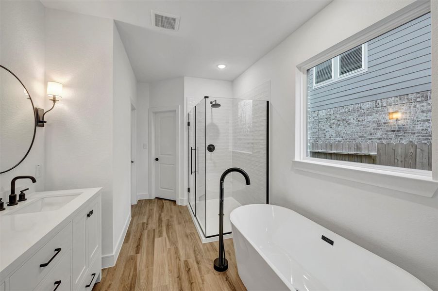 Luxurious primary bath (*Photo not of actual home and used for illustration purposes only.)