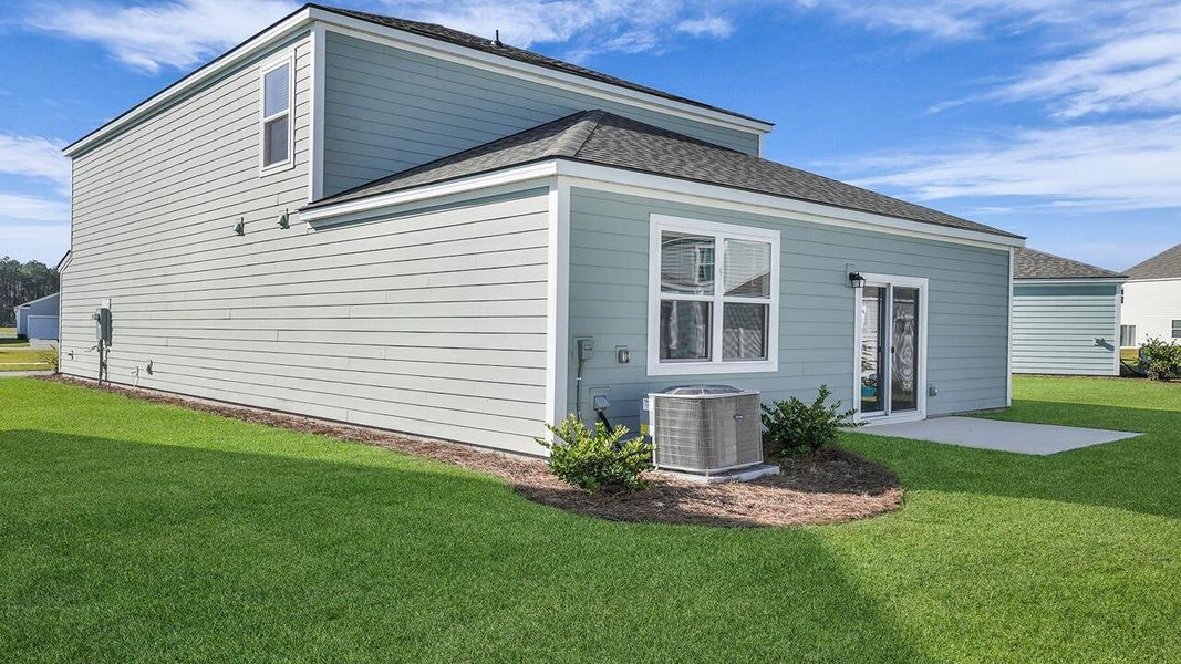 Exterior details and patio area of a home in Hillcrest, Ravenel (Image 17).