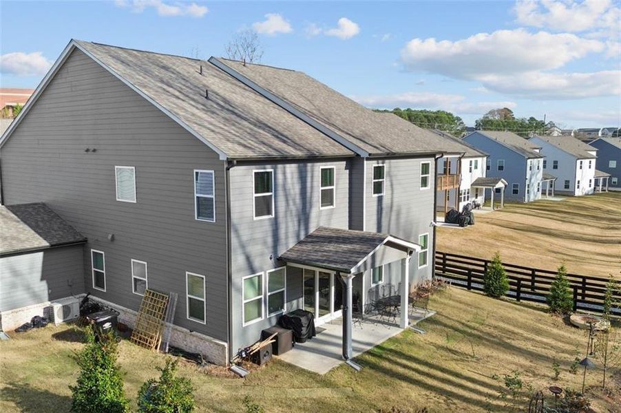 Exterior details and patio area of a home in Hillside Manor, Powder Springs (Image 4).