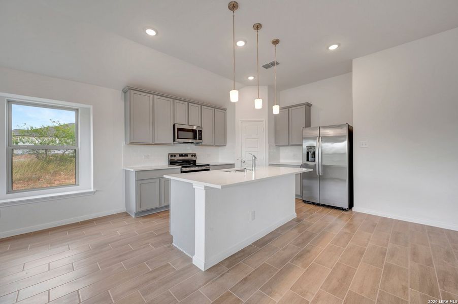 Furnished interior view inside a new home in Chaparral Ranch, Floresville (Image 4).