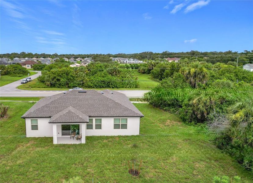 Front exterior of a new home in , North Port, FL, highlighting curb appeal (Image 2). Front exterior of a new home in , North Port, FL, highlighting curb appeal (Image 2).