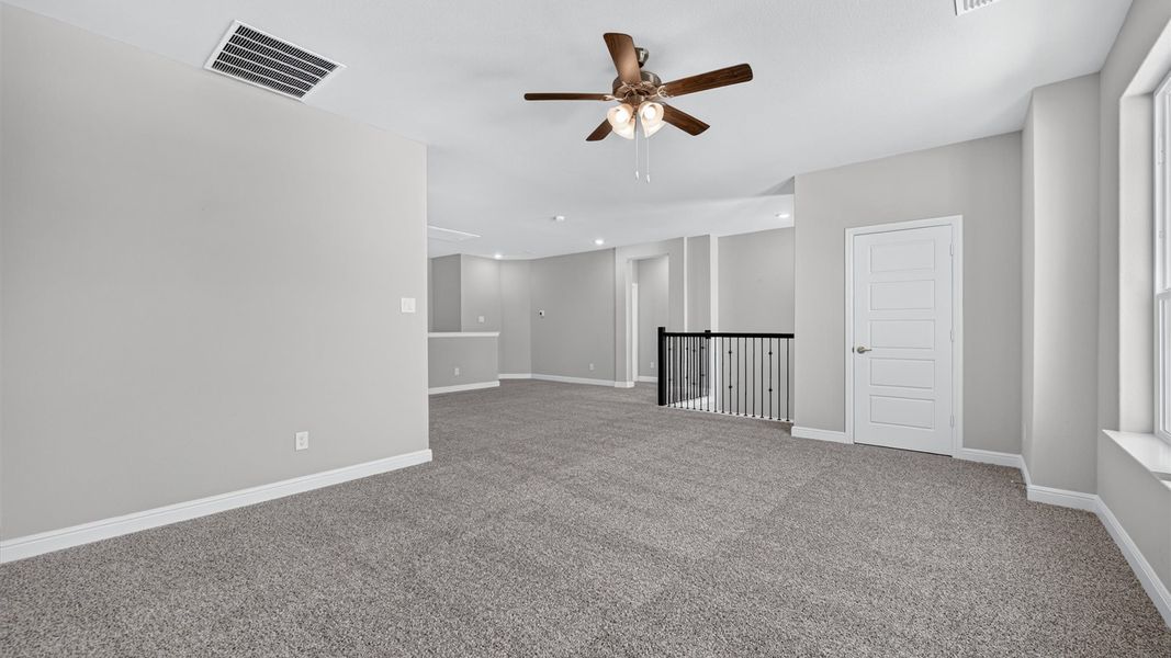 Representative unfurnished interior of a home built from the Tallow by D.R. Horton in Treeline, Justin (Image 25).