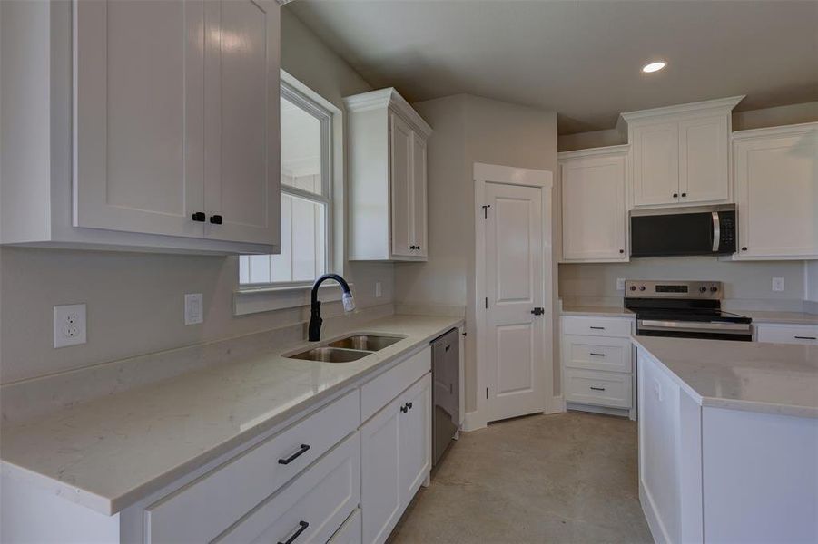 Furnished interior view inside a new home in , Whitney (Image 13).
