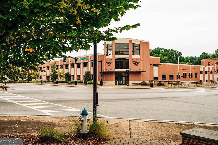 Front exterior of a new home in Rosewood Lake Estates, Hoschton, GA, highlighting curb appeal (Image 34).