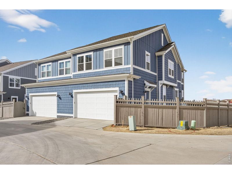 Front exterior of a new home in , Erie, CO, highlighting curb appeal (Image 16).