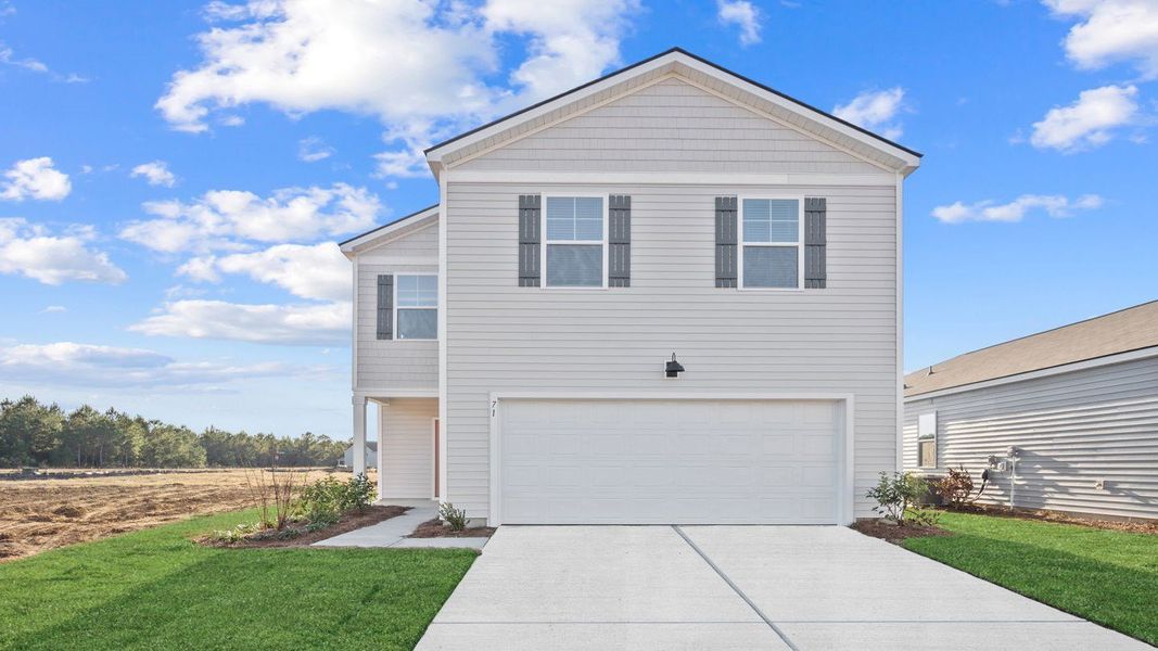 Front exterior of a new home in Rice Hope, Port Wentworth, GA, highlighting curb appeal (Image 1).
