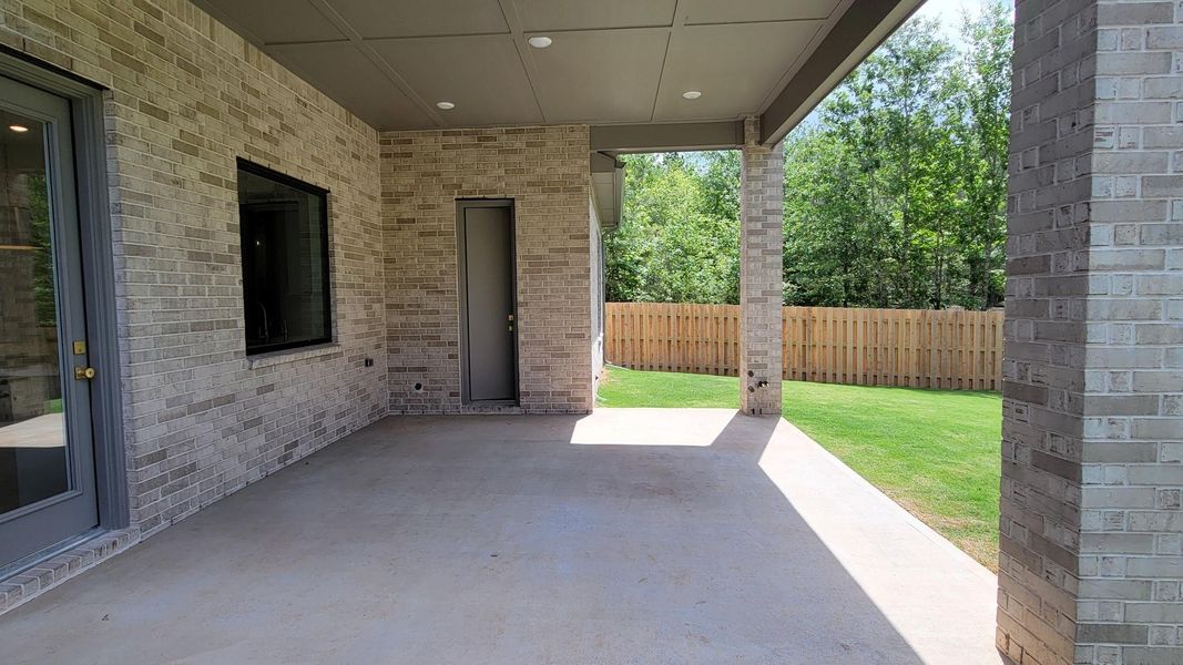 Exterior details and patio area of a home in COLTON - Fedrick Harris, Todd Mission (Image 3).