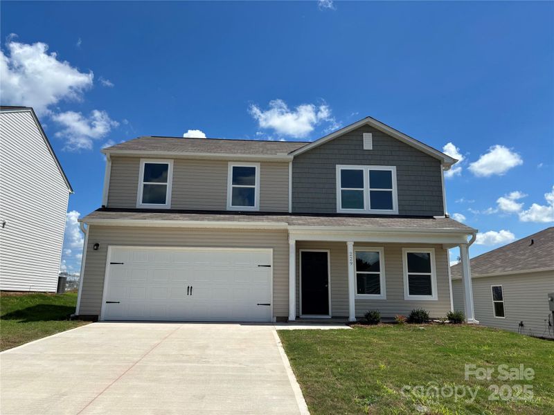 Front exterior of a new home in Buffalo Creek, Union, SC, highlighting curb appeal (Image 2). Front exterior of a new home in Buffalo Creek, Union, SC, highlighting curb appeal (Image 2).