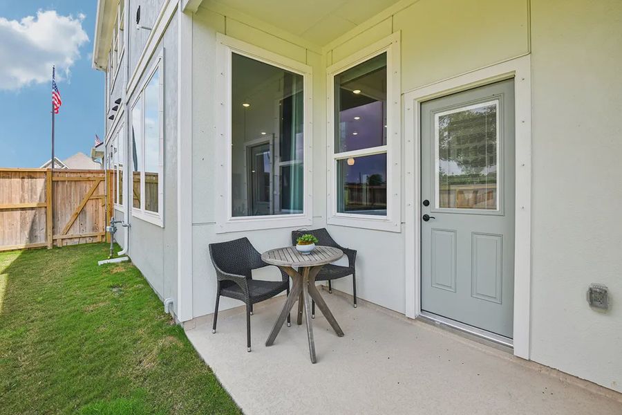 Exterior details and patio area of a home in Meridiana Chateau, Manvel (Image 3).