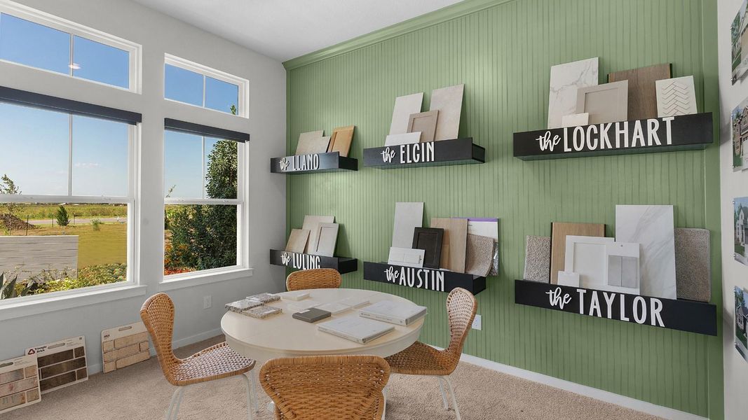 A well-lit room for selection, with various samples artfully displayed against a paneled green wall. A well-lit room for selection, with various samples artfully displayed against a paneled green wall.
