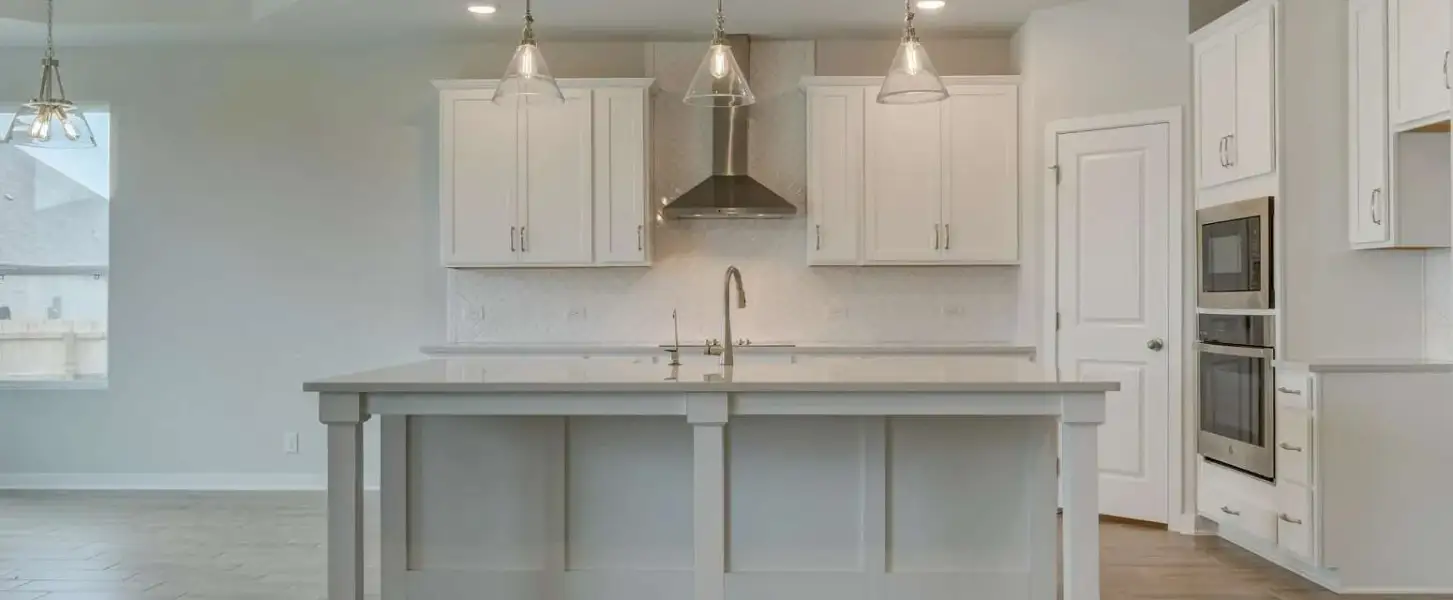 Representative furnished interior of a home built from the Guadalupe by Ashton Woods in Saddlebrook Ranch, Schertz (Image 3).